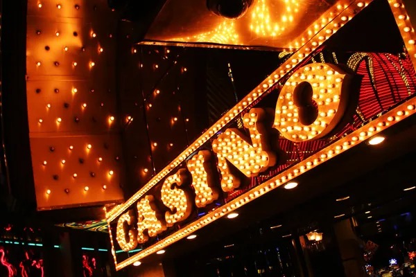 Dealer dealing cards at an infinite blackjack table